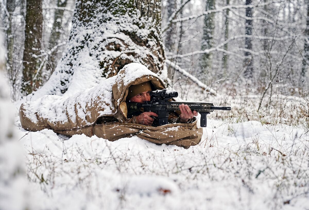Field operator in a snowy forest